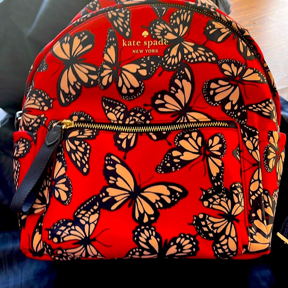 Kate spade chelsea butterfly back pack medium! Excellent condition!